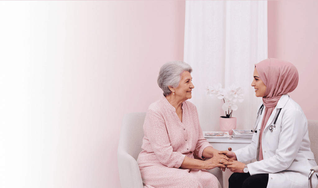 A doctor and an elderly patient talking, representing healthcare